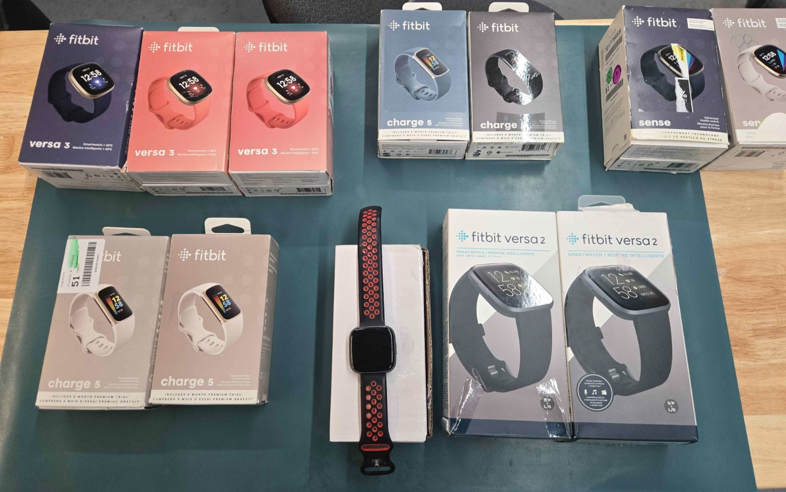 Lot of 15 Mixed Fitbit Smartwatch and Fitness Tracker - Untested